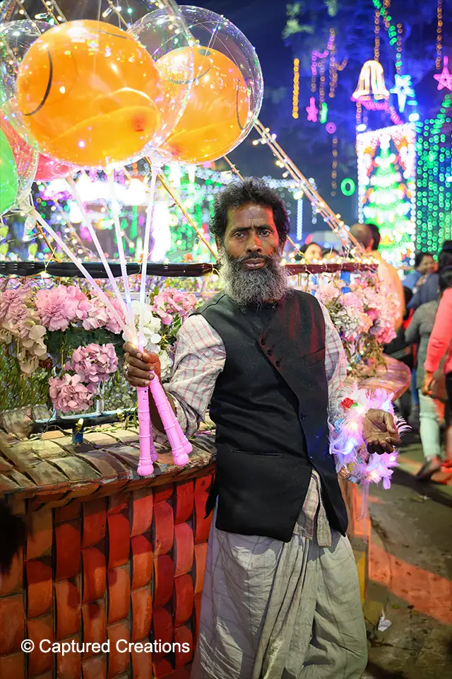the, captured, creations, creation, sudip, biswas, captured creations, sudip biswas, photography, cinematography, filmmaker, photographer, cinematographer, people, colorful, gift, small, seller, market, buyer, balloons, commerce, life, vendor, toy, balloon, sell, trader, sale, hawker, design, tradition, fairy, gifts, bulb, retro, lighting, decorative, decoration, traditional, outdoor, december, xmas, holiday, work, person, man, business, salesman, happy, new, year, celebration, kolkata, christmas, festival, utsav, season, allen, park, churches, india, street, kolkata, west, bengal, india