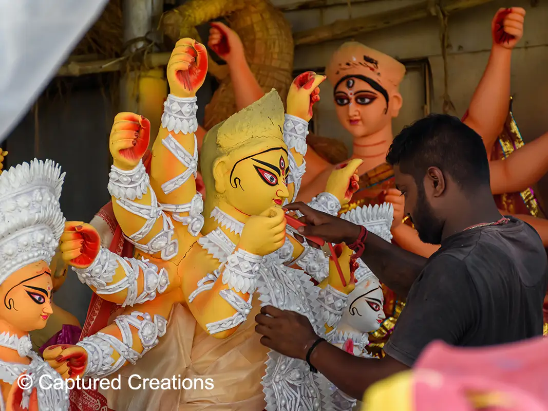 Crowds gathered on the ghats at dawn for Mahalaya Tarpan